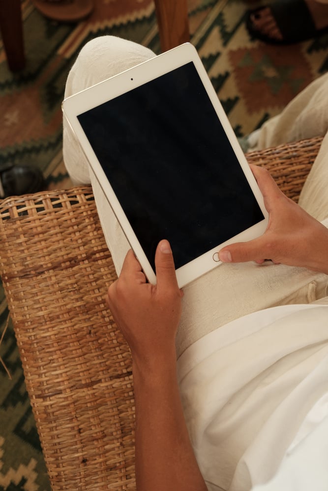 Man Using Tablet While Working